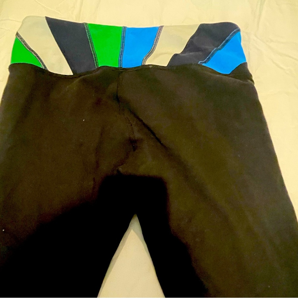 Lululemon Wonder Under reversible blue green white waistband crop pants sz 8